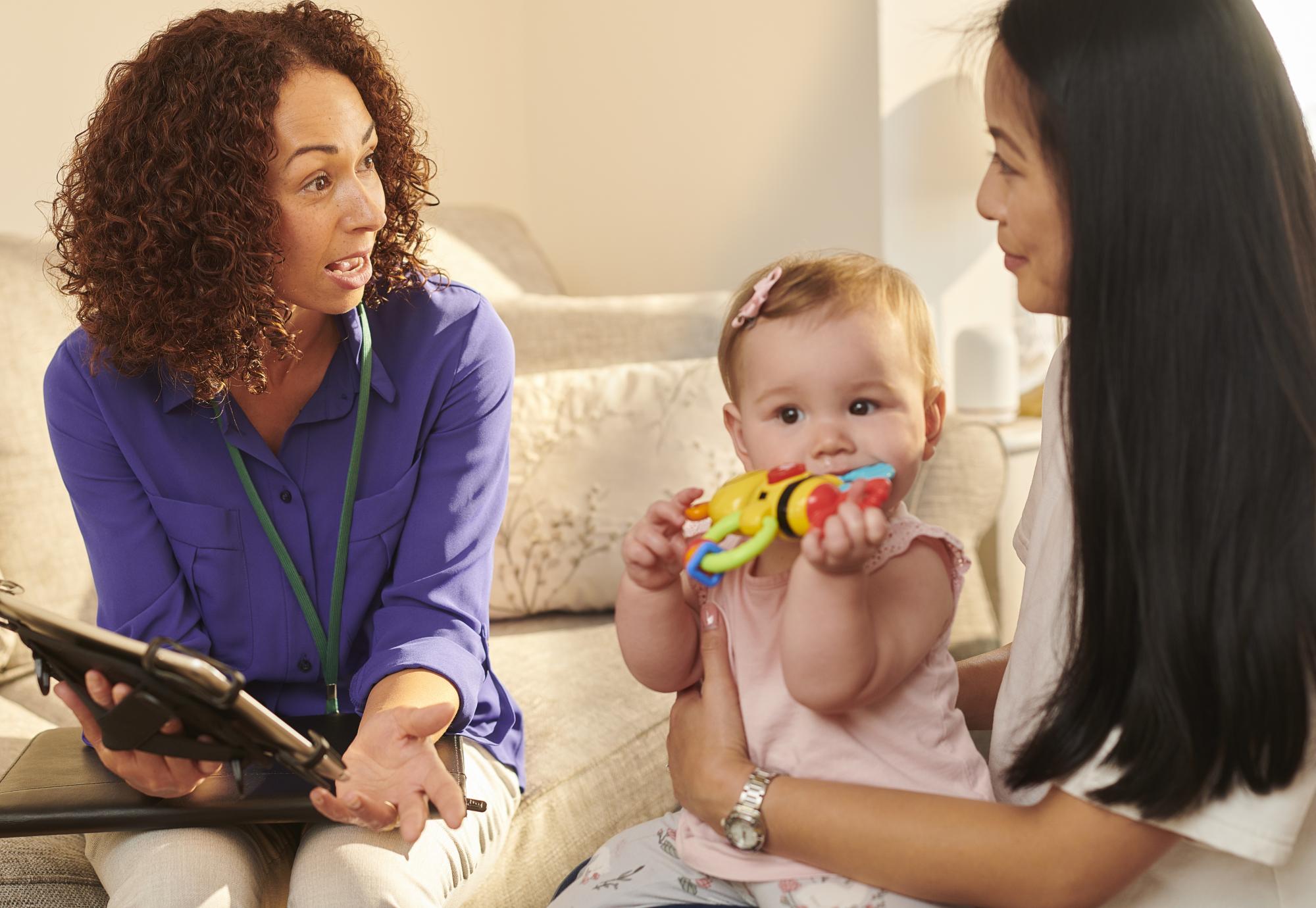 A health worker visiting a young family