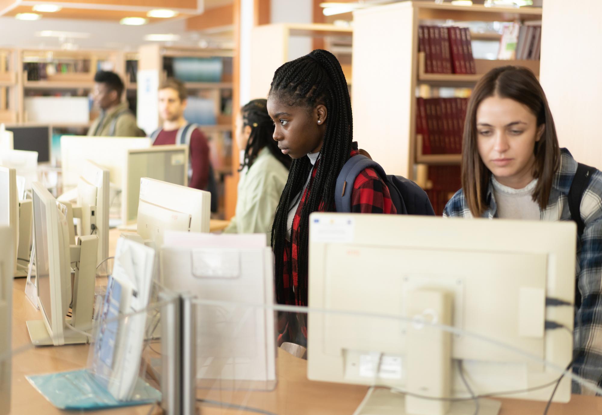 People using library computers