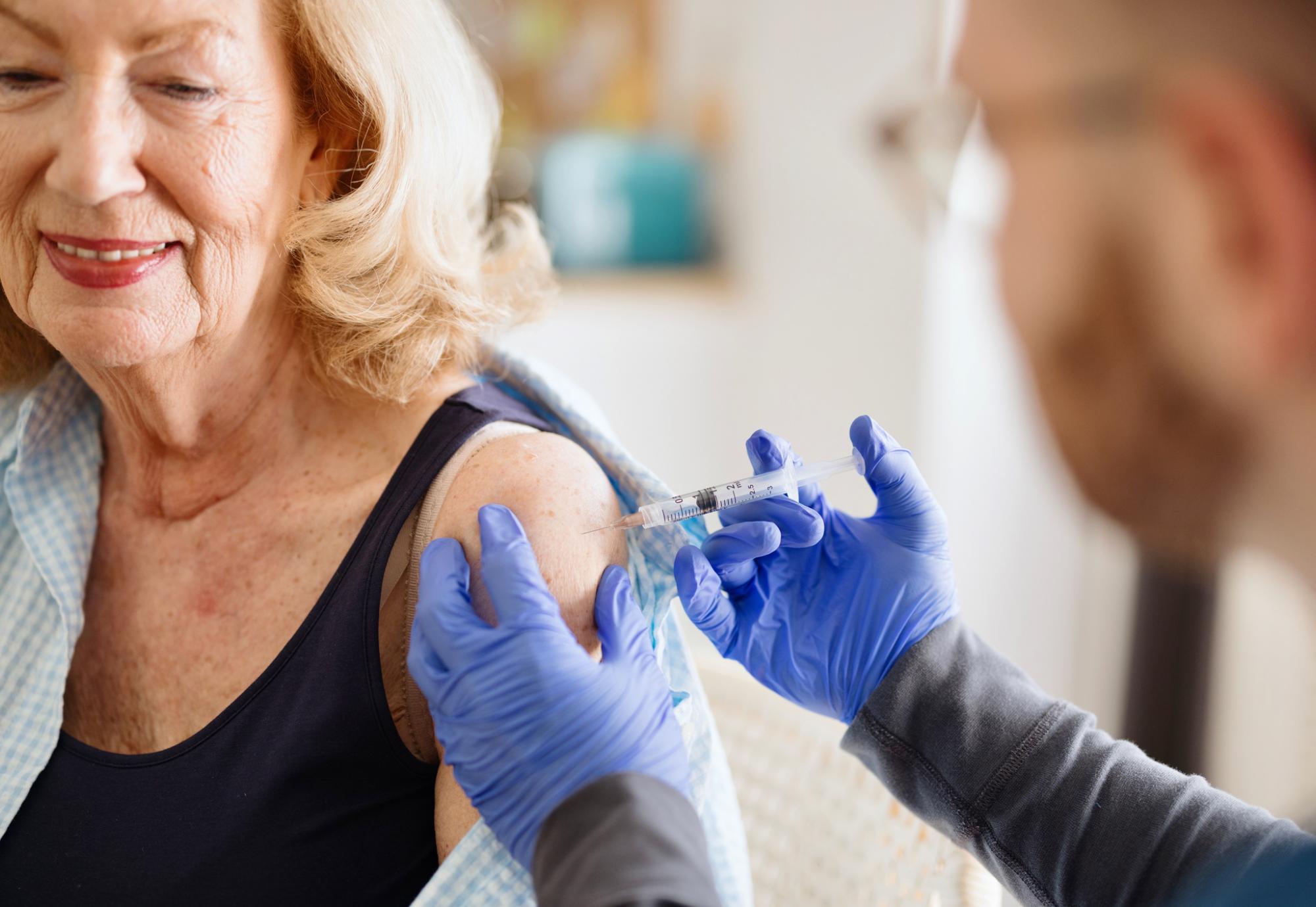 Close-up of a woman getting a vaccine