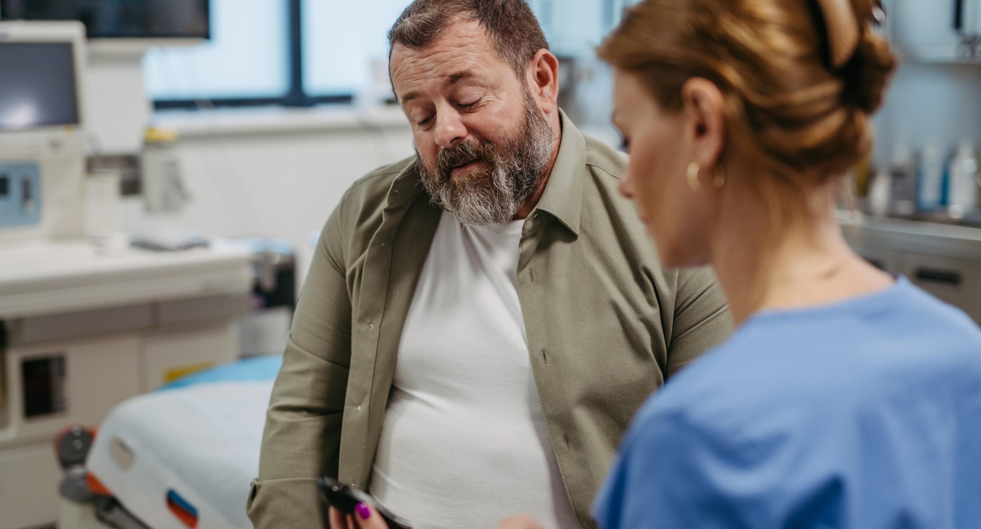 Doctor checking blood glucose level