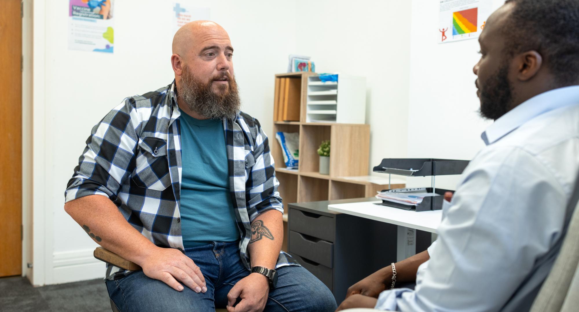 Man with mental health doctor