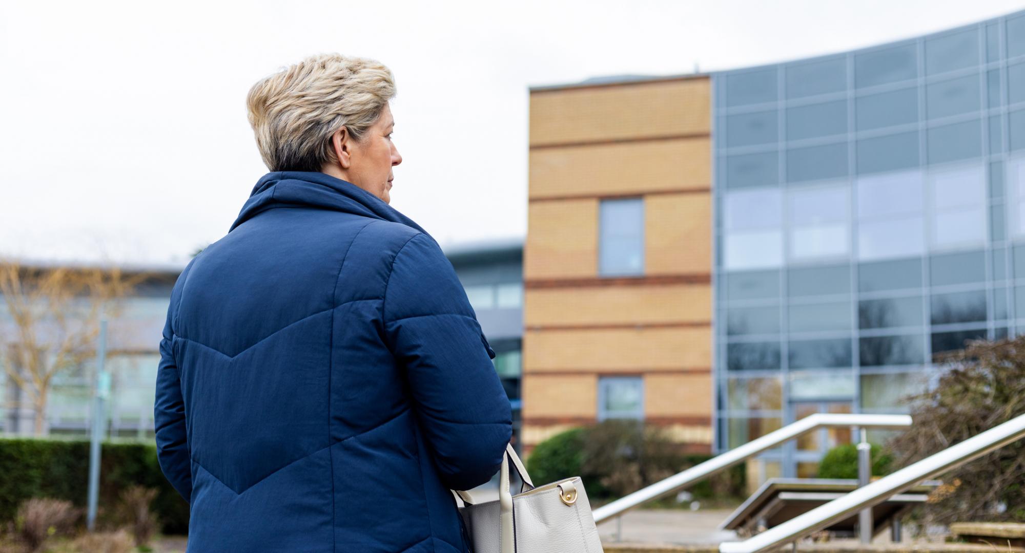 Woman outside a hospital