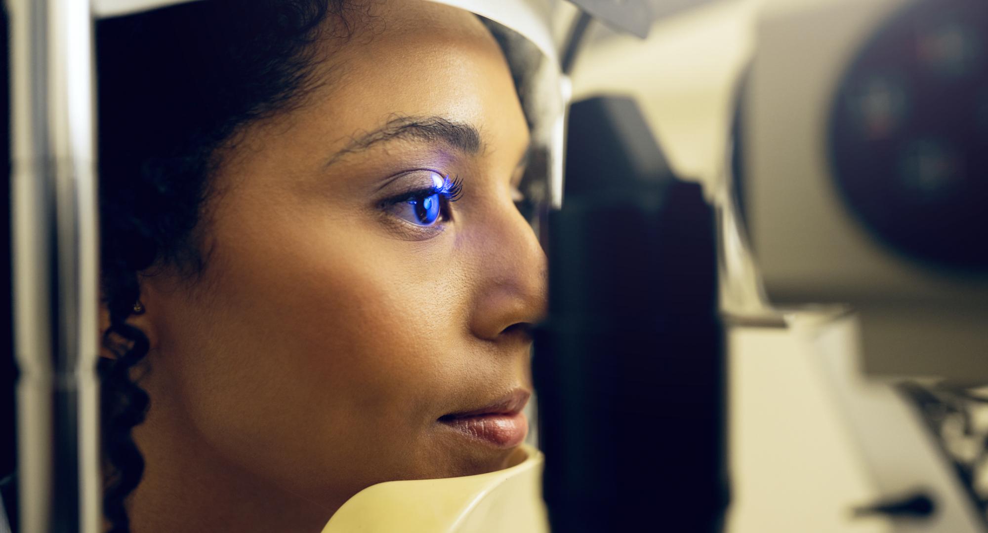 Woman having her eyes scanned