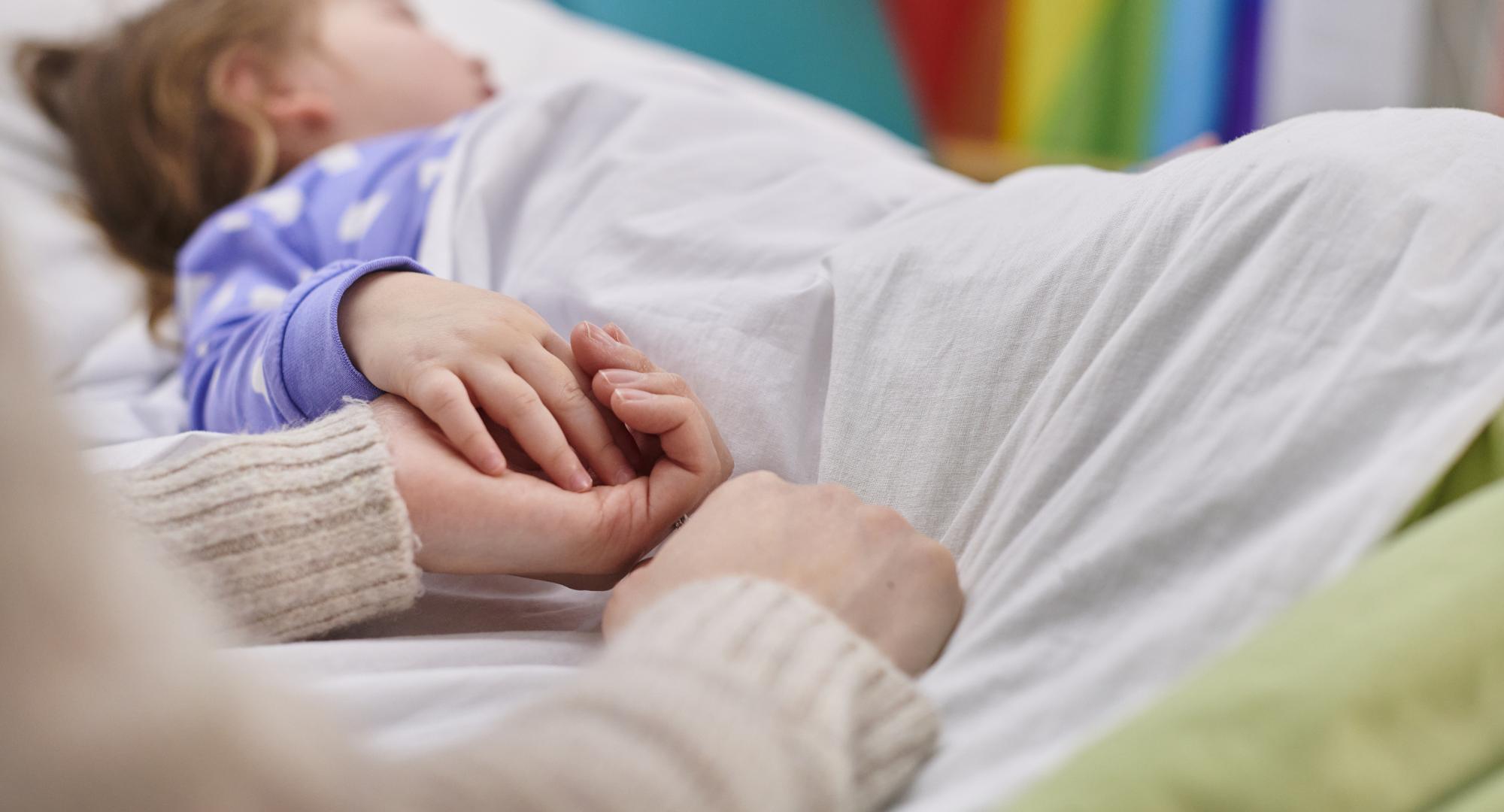 Child in hospital bed