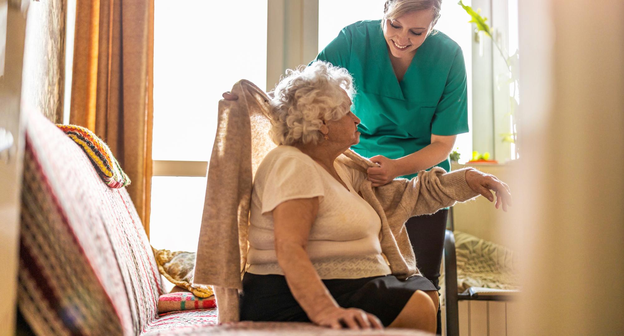 Old woman with care worker