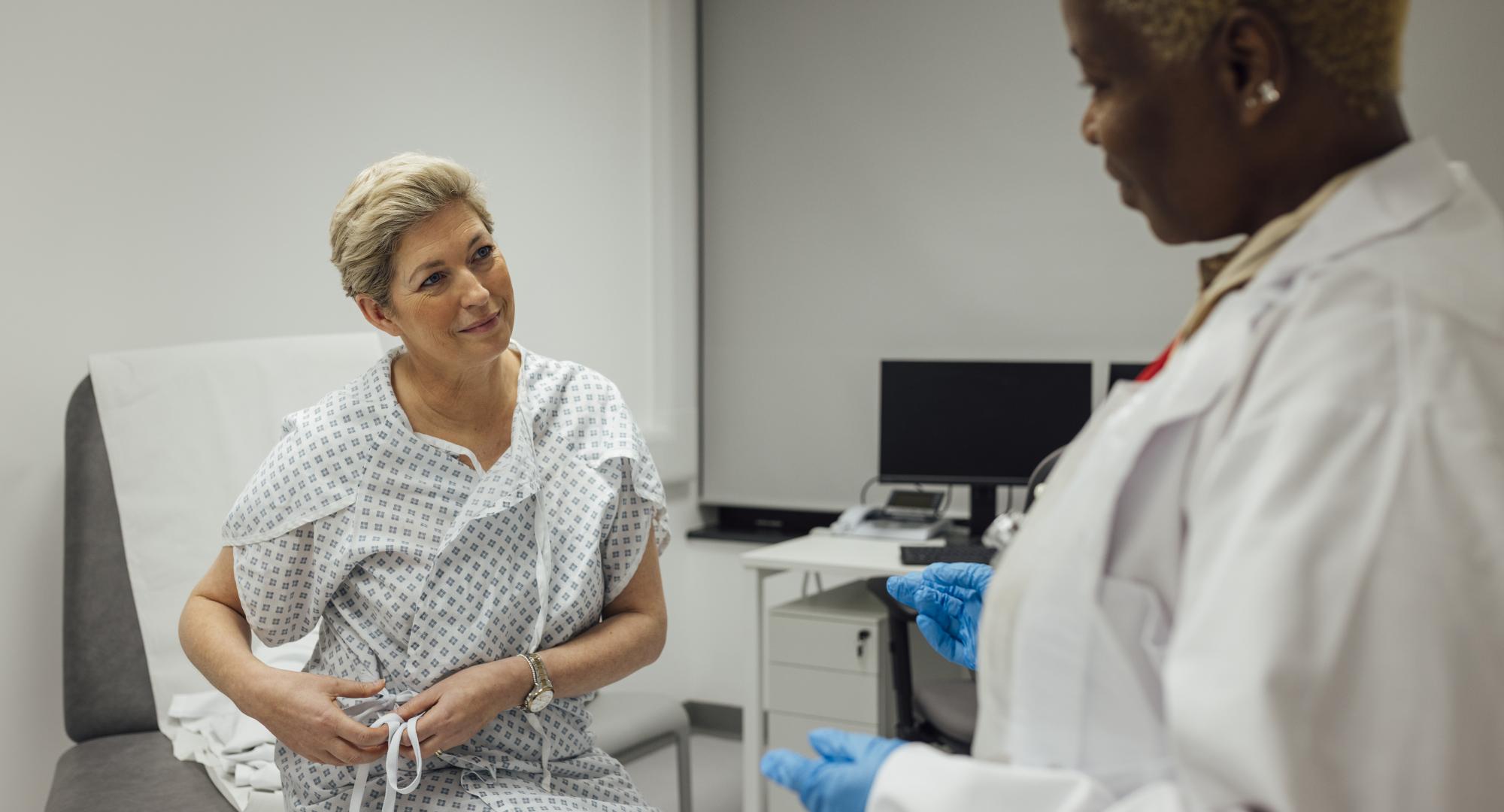 Breast cancer patient with doctor
