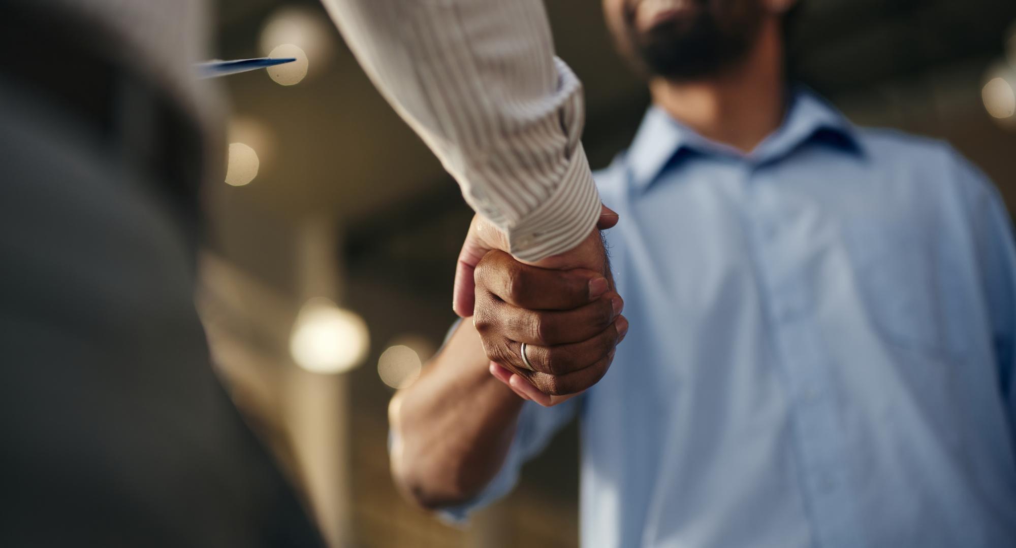 Two people shaking hands