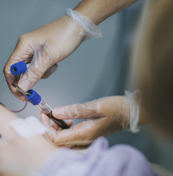 nurse drawing blood for a blood test