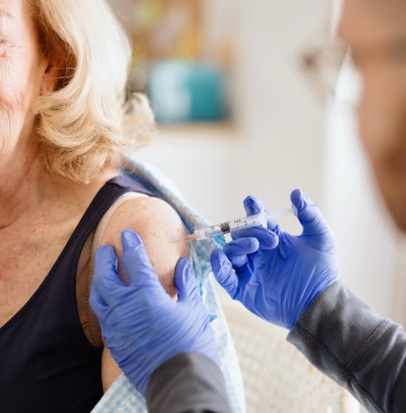 Close-up of a woman getting a vaccine