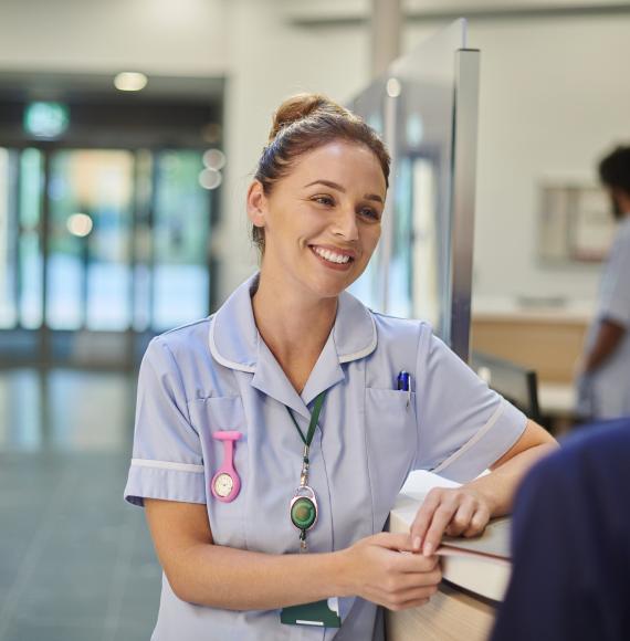 Nurse chatting to staff nurse