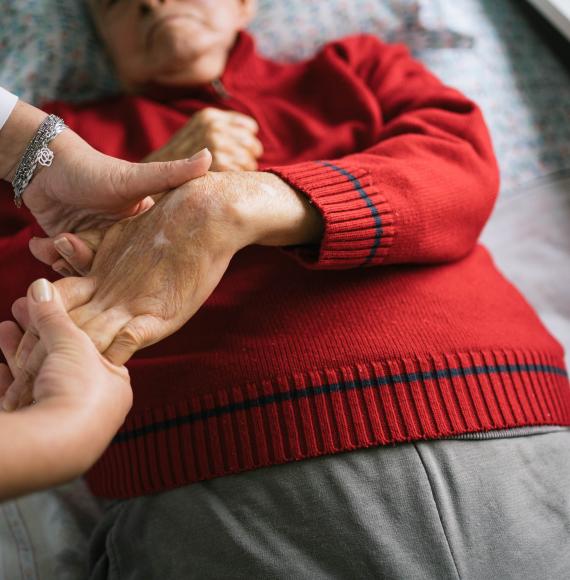 Senior man with stroke doing physical therapy