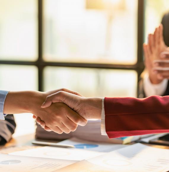 Two people shaking hands